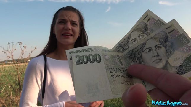 A Girl Gives A Pick-up Truck On The Street For Money